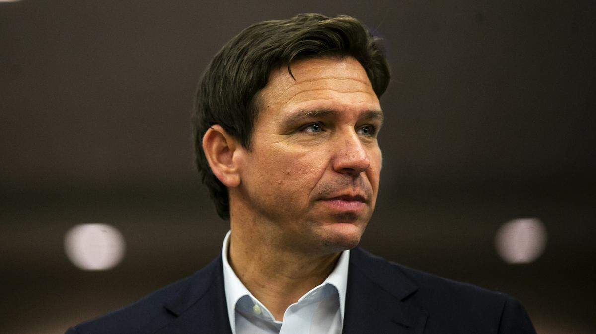 Florida Gov. Ron DeSantis greets guests after an Iowa GOP reception, Saturday, May 13, 2023, at The Hotel at Kirkwood Center in Cedar Rapids, Iowa.