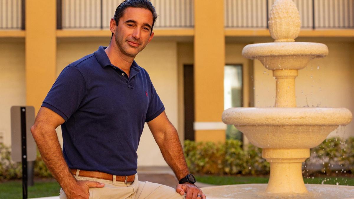 Second-generation affordable housing developer Raul Rodriguez is shown at his Li’l Abner I apartment community in the Miami-area on Tuesday, Aug. 30, 2022.