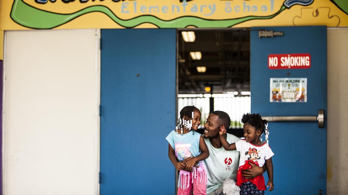 Lamott Croom, 30, the father of 5-year-old Lyric Croom and 3-year-old Londyn Croom, volunteers with the Fatherhood Task Force of South Florida, an initiative to increase involvement in schools throughout Miami-Dade County by giving fathers and male role models more opportunities with children in their community.