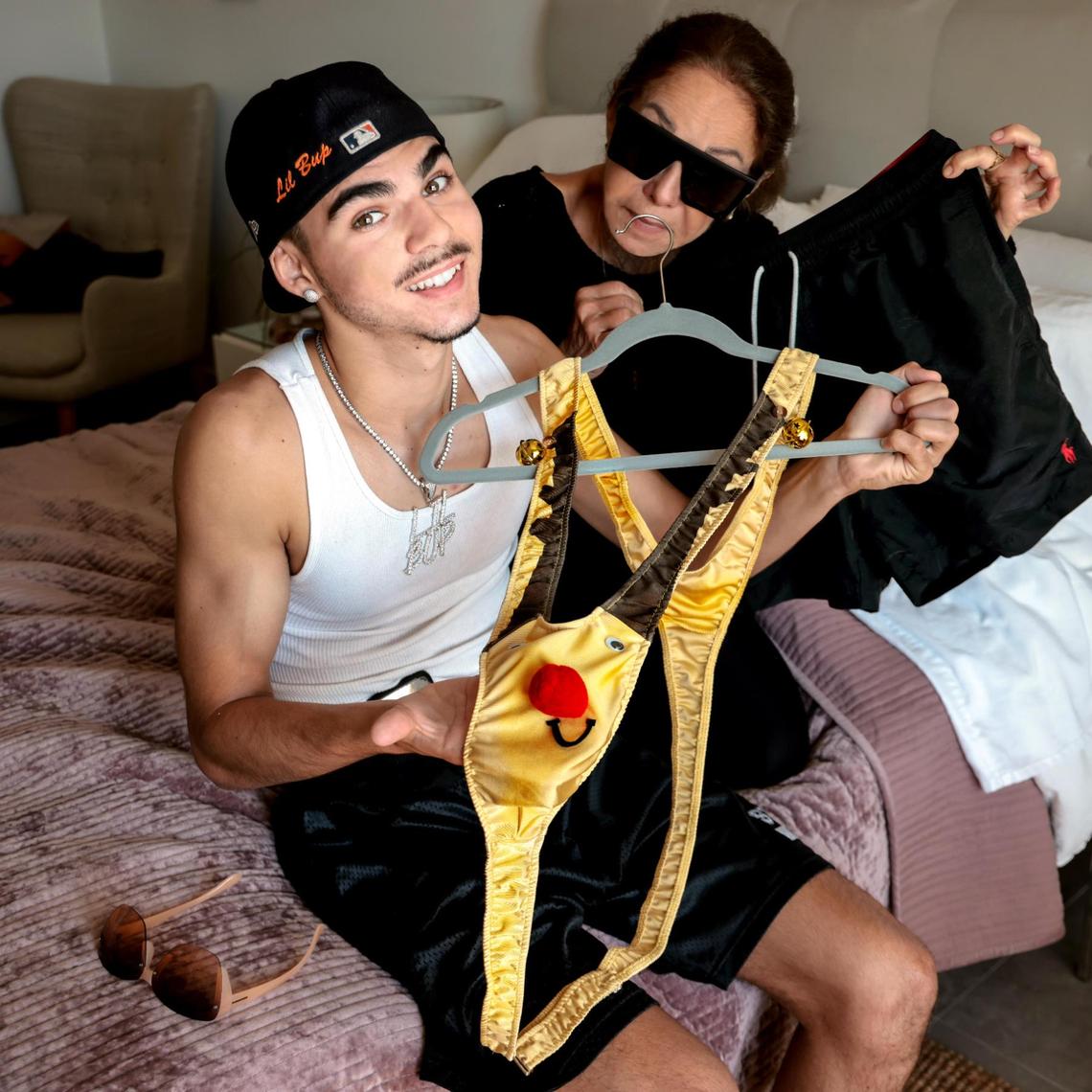 Sebastian Romney, left, prefers the Reindeer Mankini over the choice of his grandmother, Jenny Romney, right.