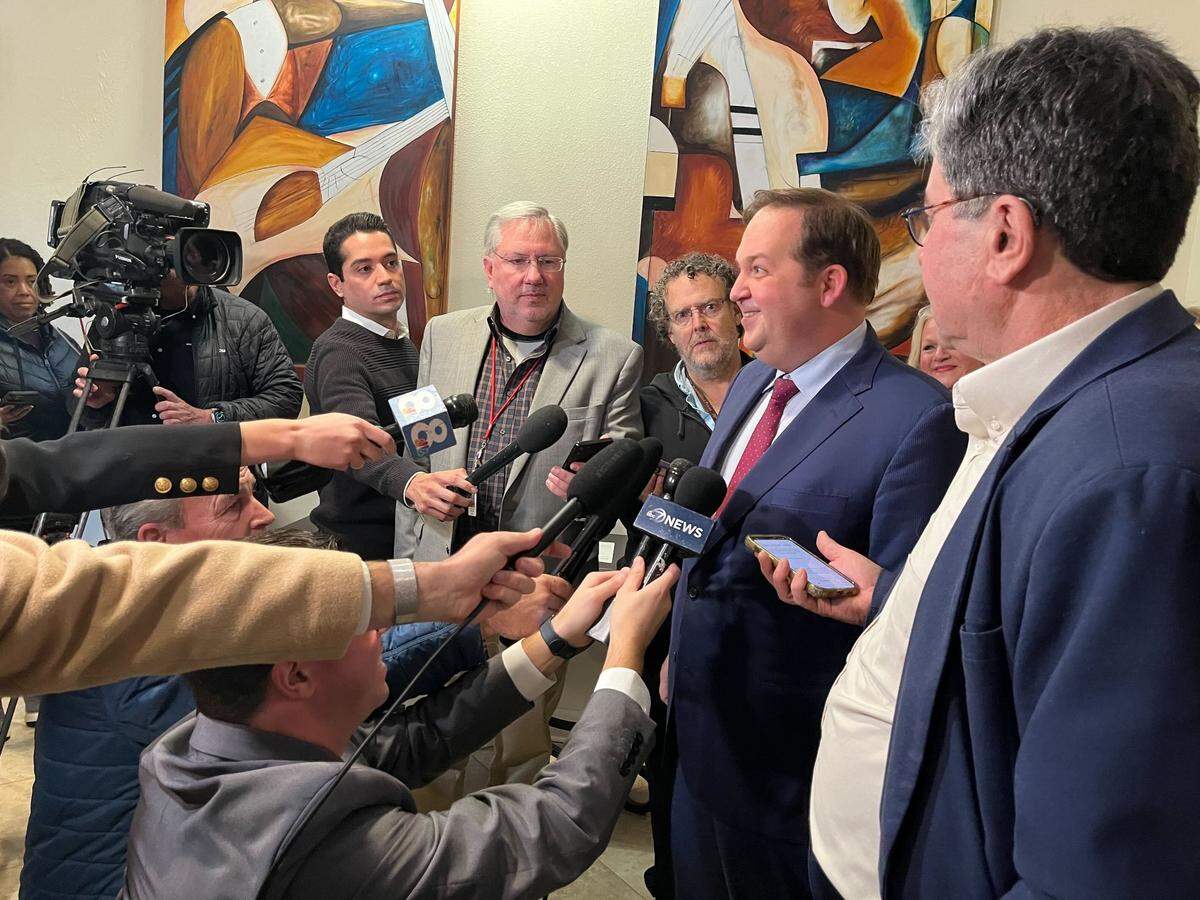 Evan Power speaks to reporters after being elected the new chairperson of the Republican Party of Florida on Jan. 8, 2024.