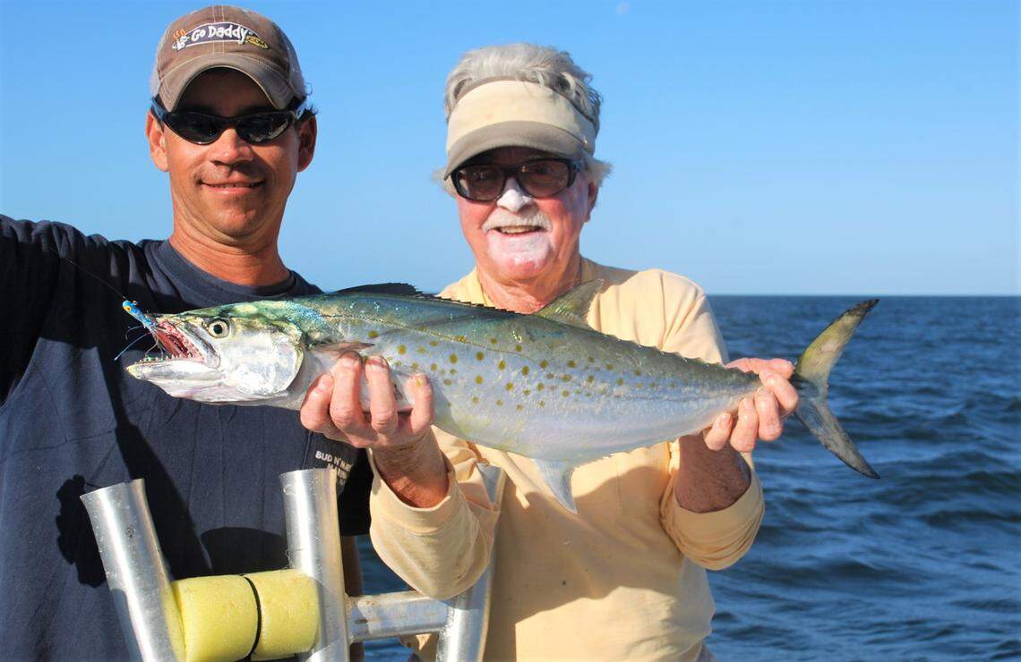 Captain Richard Stanczyk of Islamorada holds a Spanish mackerel caught on a jig by Capt. Dave Peck while fishing near Sprigger Bank in the Gulf of Mexico.