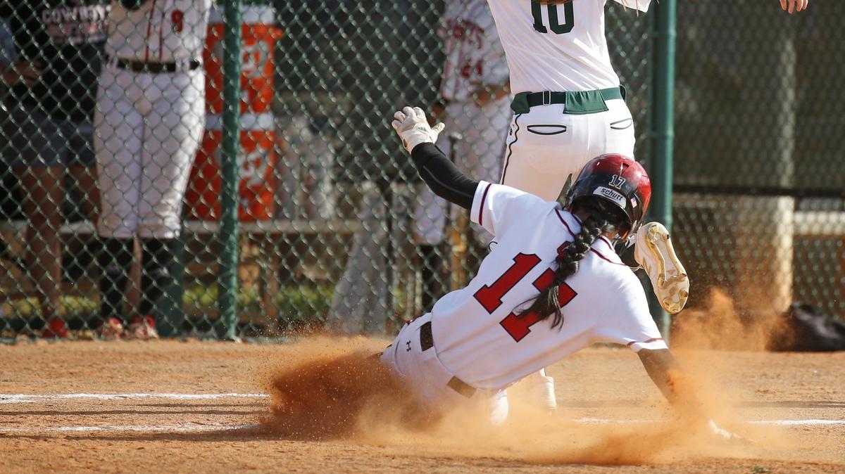 Amanda Gettys (17) slides safely into third base in the 6th inning as Cooper City plays Lakewood Ranch at Jackie Robinson Training Complex in Vero Beach on Thursday, May 23, 2019.
