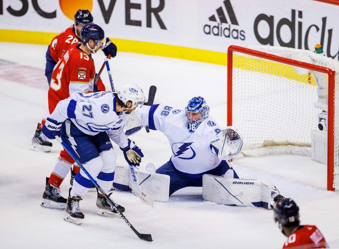 Tampa Bay Lightning goaltender Andrei Vasilevskiy (88) and defenseman Ryan McDonagh (27) defend the goal from Florida Panthers center Sam Reinhart (13) and right wing Claude Giroux (28) during the second period of Game 2 of a second round NHL Stanley Cup series at FLA Live Arena on Thursday, May 19, 2022 in Sunrise, Fl.
