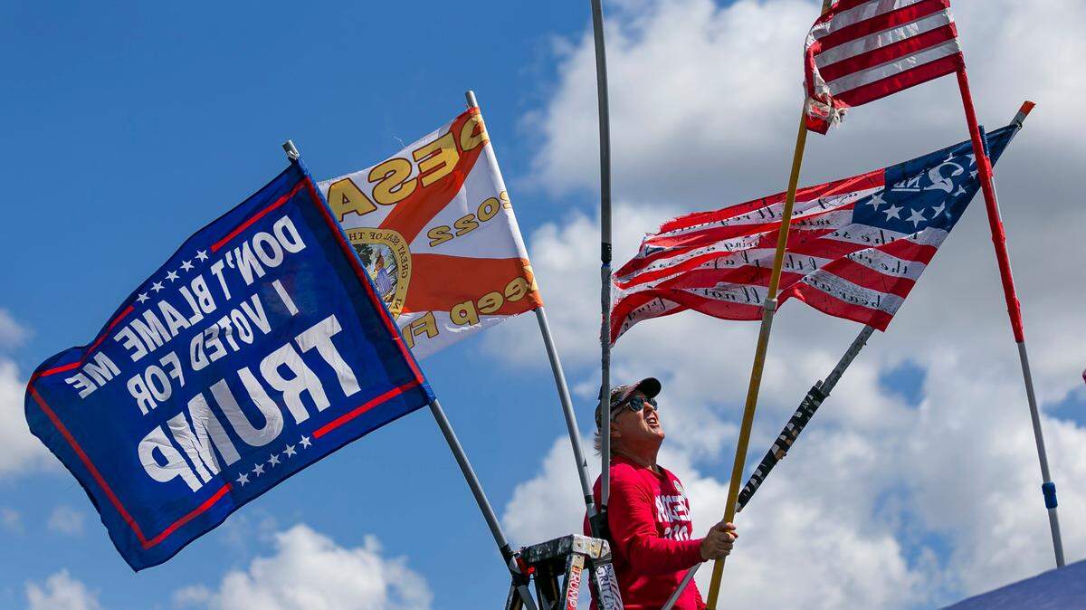 See photos of Trump supporters arriving at the American Freedom Tour event in Broward