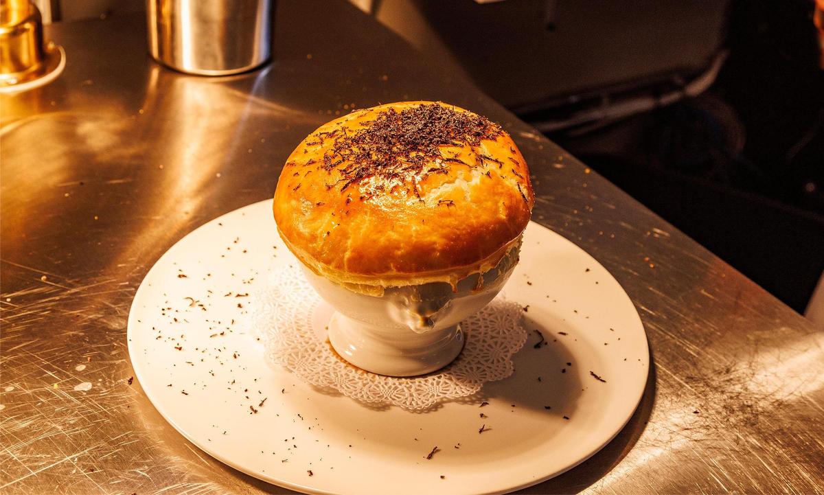 The chicken pot pie, topped with shaved truffle, is one of the most popular items at Grand Central in Miami.