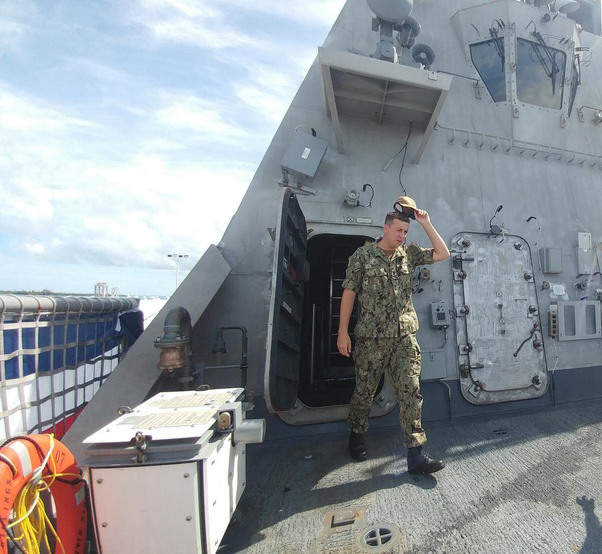 A sailor walks along the USS Billings in Key West at the Truman Waterfront.