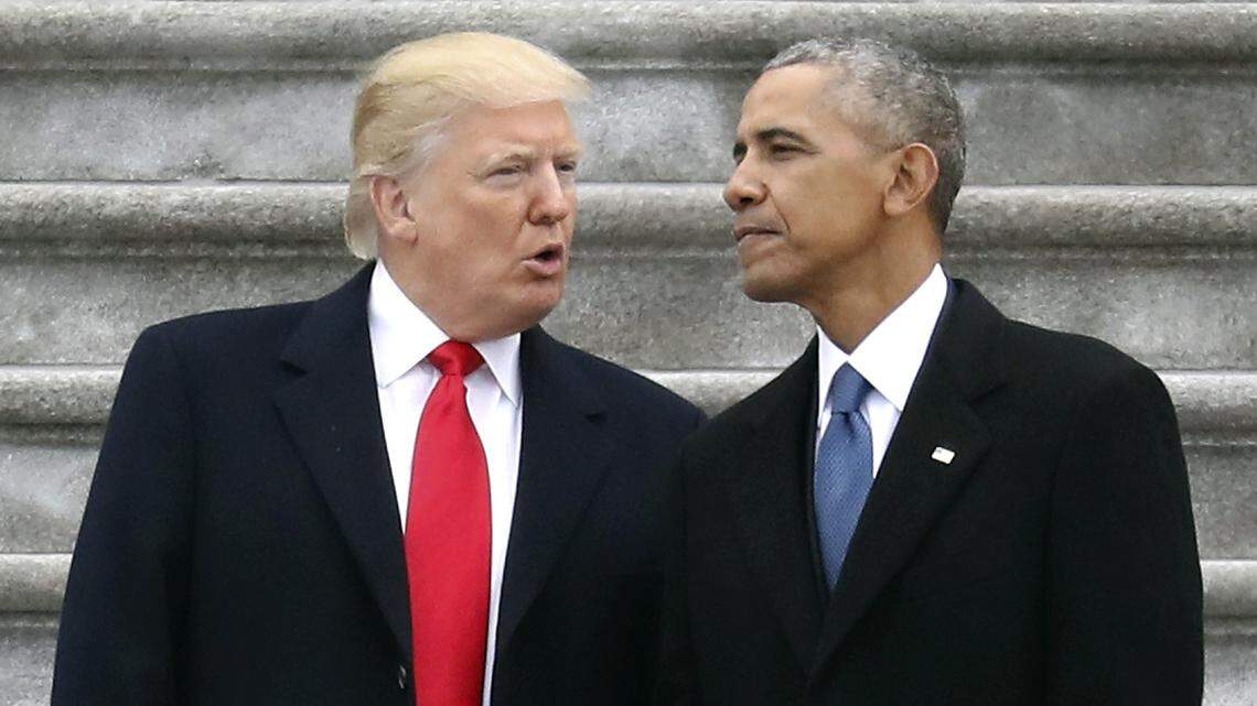 FILE - In this Friday, Jan. 20, 2017, file photo, President Donald Trump talks with former President Barack Obama on Capitol Hill in Washington, prior to Obama's departure to Andrews Air Force Base, Md.