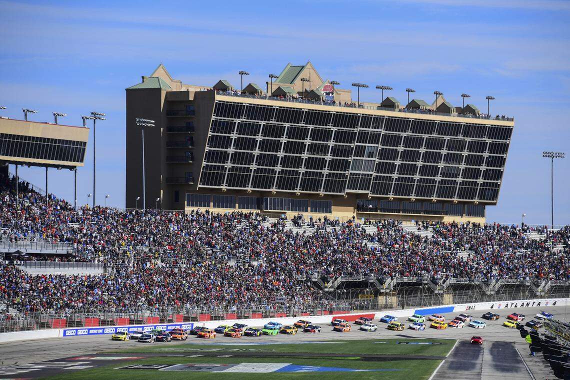 In this Feb. 24, 2019, file photo, a NASCAR Monster Energy NASCAR Cup Series auto race starts at Atlanta Motor Speedway in Hampton, Ga. NASCAR and IndyCar have each called off their races this weekend. NASCAR was scheduled to run Sunday at Atlanta Motor Speedway without spectators but said Friday, March 13, 2020, it is calling off this weekend and next week’s race at Homestead-Miami Speedway. IndyCar was scheduled to open its season Sunday on the streets of St. Petersburg, Florida, but suspended it’s season through the end of April.