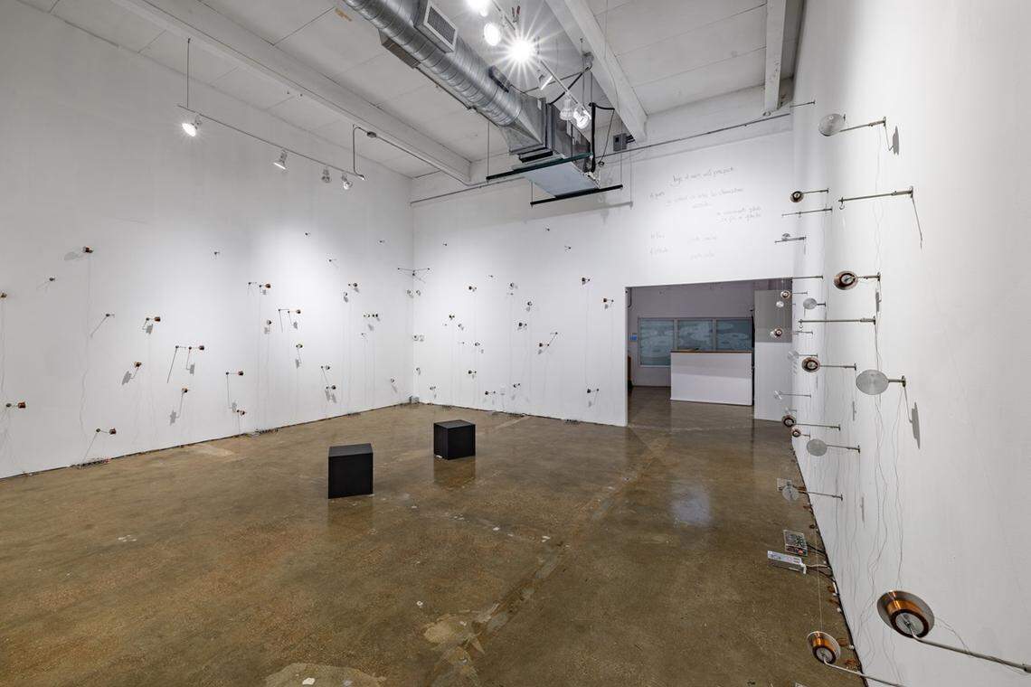 “Dialogue with the Primordial Sea” at Locust Projects through Thursday, Jan. 23 features a series of magnetic spheres that alternately levitate or pendulate as they interact with invisible magnetic fields.