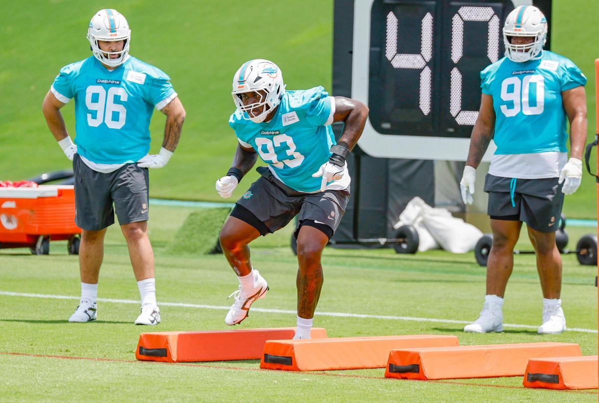 Miami Dolphins defensive tackle Zeek Biggers (93) runs through drills at Dolphins rookie minicamp at the Baptist Health Training Complex in Miami Gardens, Florida on Friday, May 9, 2025.