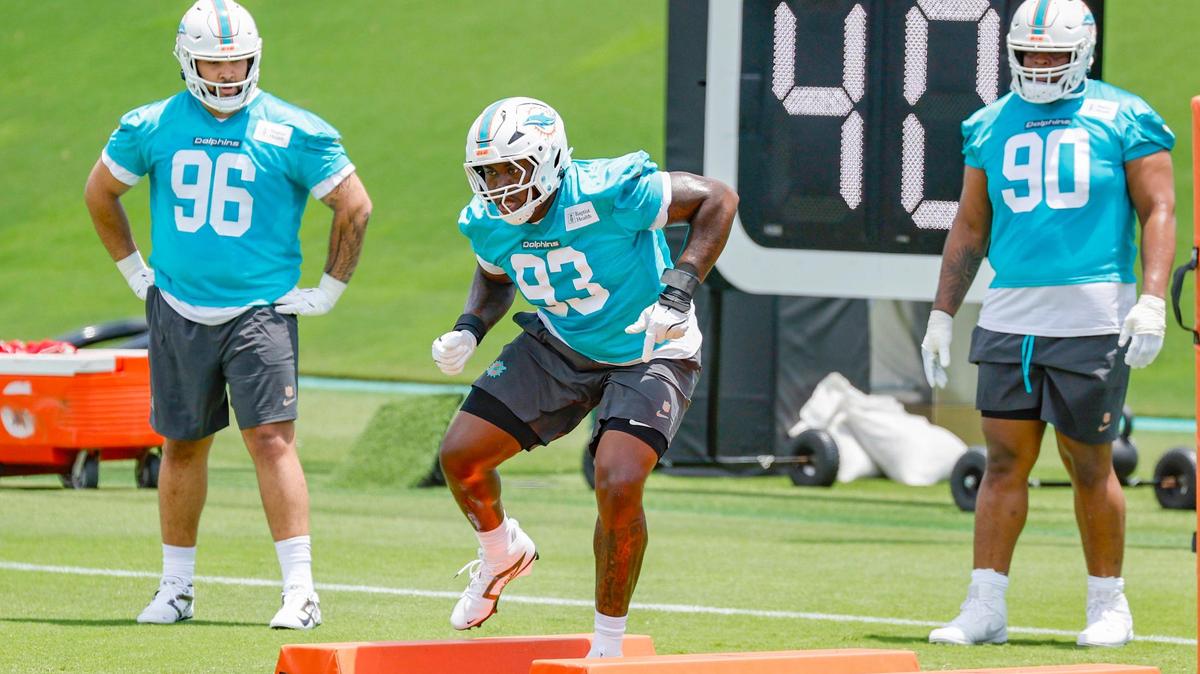 Miami Dolphins defensive tackle Zeek Biggers (93) runs through drills at Dolphins rookie minicamp at the Baptist Health Training Complex in Miami Gardens, Florida on Friday, May 9, 2025.