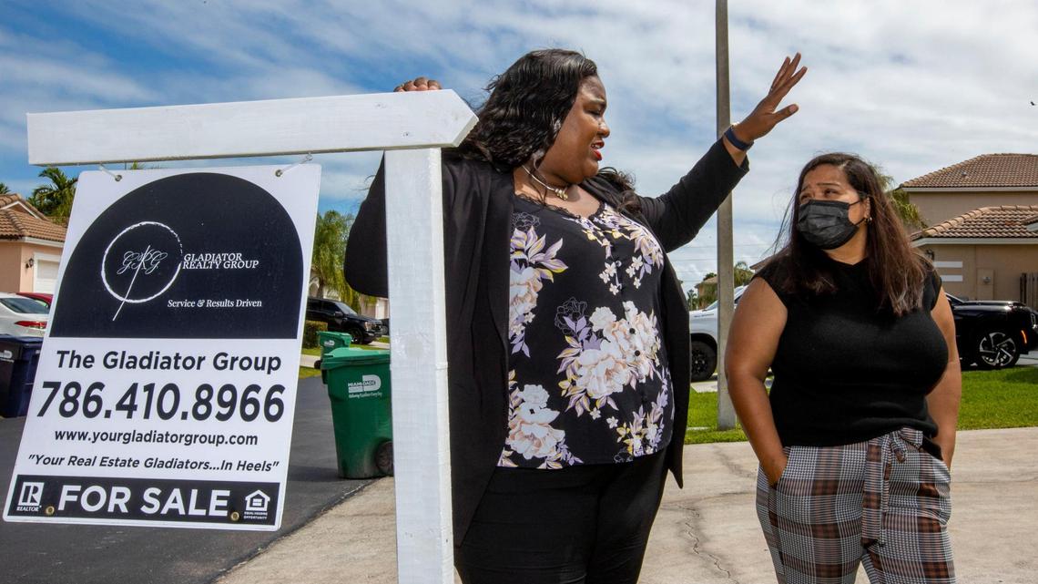 Dawn N. Reid Broker/CEO of Gladiator Realty Group shows her client Melissa Usubillaga a property for sale located in Cutler Bay, Florida, on Friday, March 4, 2022.