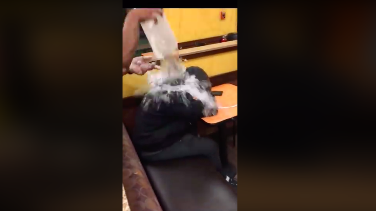 A viral video of a Dunkin’ Donuts employee dumping water on a sleeping man in Syracuse, NY prompted outrage online, a fundraising campaign and a small protest outside the store from advocates for the homeless.