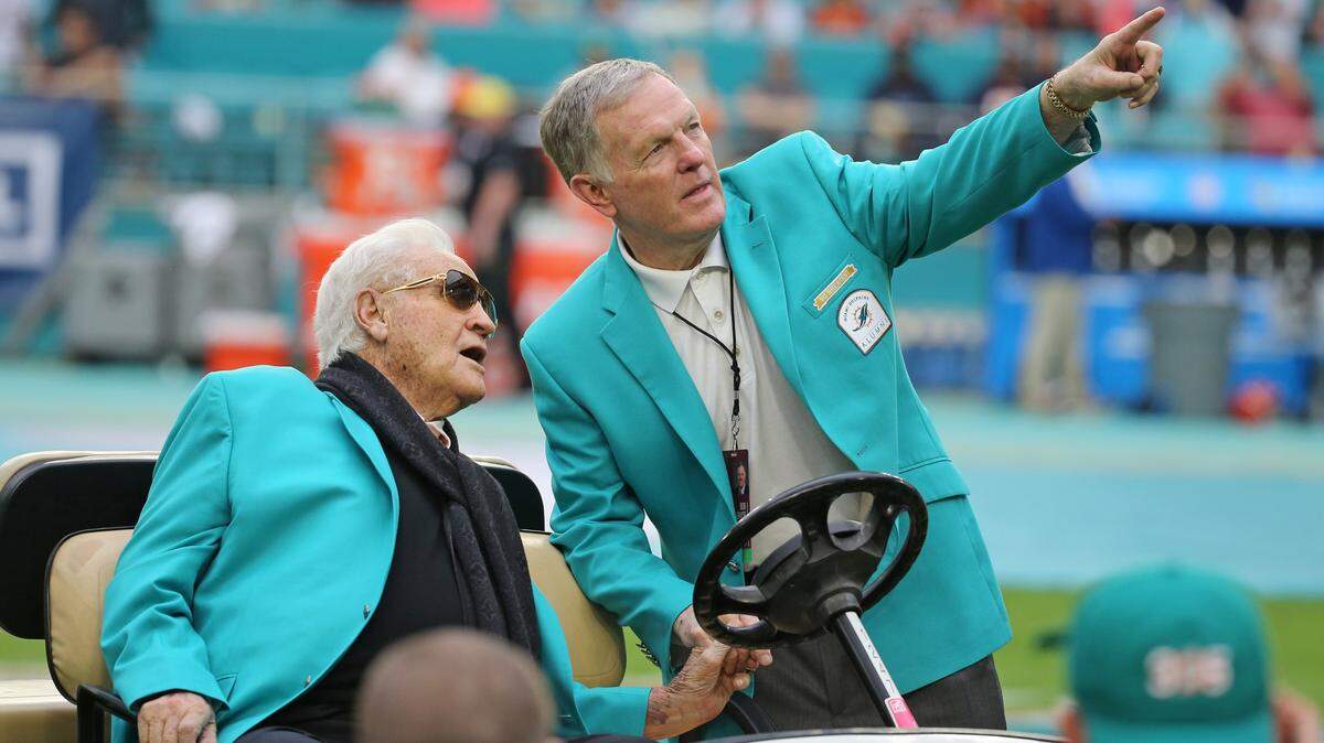 Coach of the perfect season, Don Shula with quarterback Bob Griese during halftime ceremony celebrating the undefeated 1972 team as the Miami Dolphins host the Cincinnati Bengals at Hard Rock Stadium in Miami Gardens on Sunday, December 22, 2019.