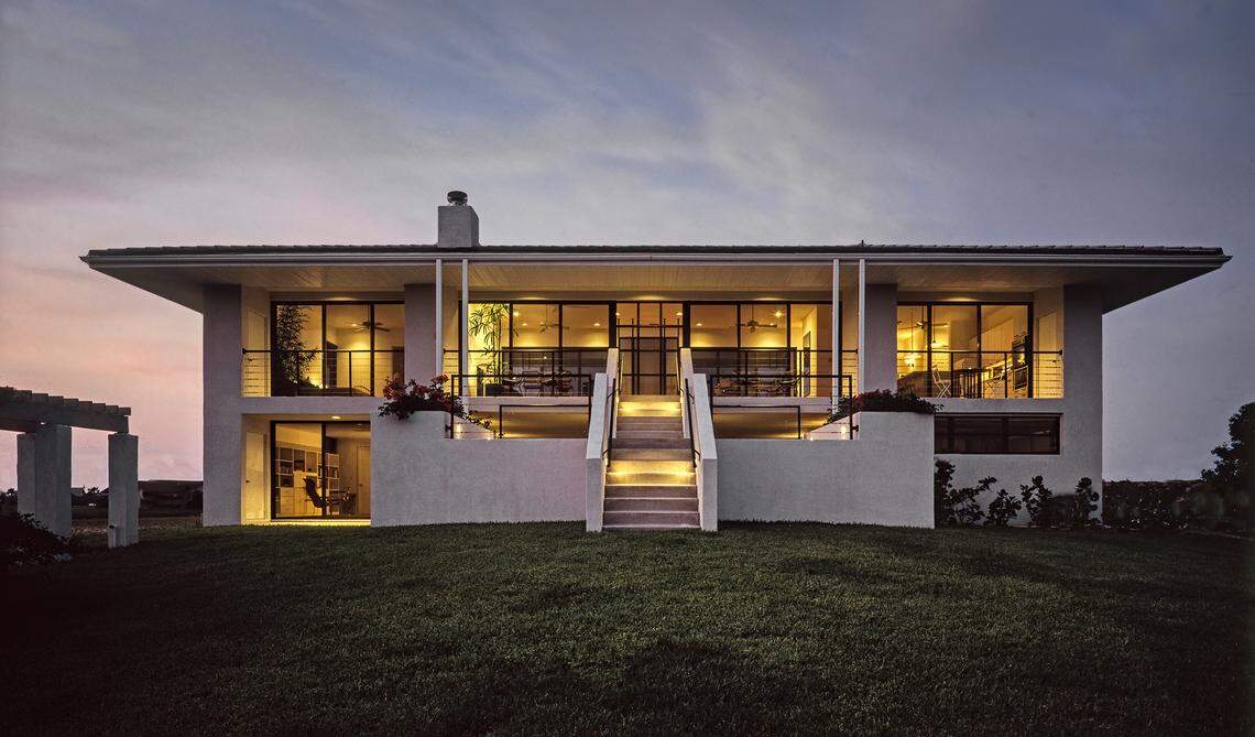 The windows that line the walls of this house in Punta Gorda, designed by Suzanne Martinson, can be thrown open to let in a breeze on cool winter days or nights later in the year.