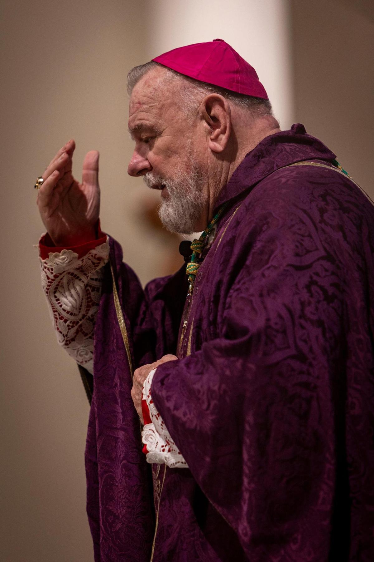 Fort Lauderdale, FL- March 5, 2025 - Archbishop Thomas Wenski makes the sign of the cross as he celebrates mass at St. Anthony Church in Fort Lauderdale, Florida on the occasion of Ash Wednesday. Ash Wednesday marks the beginning of the 40-day Lenten season, a time of penance and preparation for the commemoration of the passion and death of Jesus Christ and his ultimate resurrection on Easter Sunday.