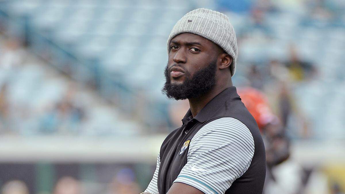 In this Nov. 5, 2017, file photo, Jacksonville Jaguars running back Leonard Fournette watches players warm up during before an NFL football game in Jacksonville, Fla. Fournette was arrested Thursday, April 11, 2019, for driving with a suspended license and released a short time later. Fournette paid a $1,508 bond and was freed after spending less than 30 minutes in the Duval County Jail, according to jail records.