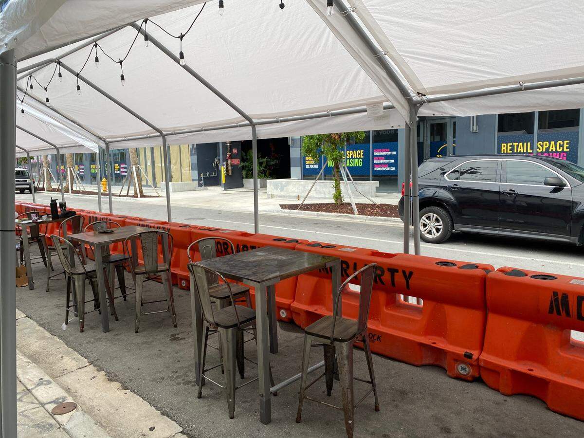 Kyu restaurant was the first Wynwood restaurant to turn parking spaces out front into outside seating, which was the only kind of dine-in service Miami-Dade County would allow starting July 9 because of the rise in coronavirus cases.