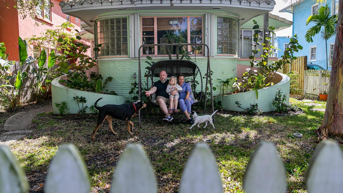 Homebuyers today face historic prices in South Florida, despite a slowdown in sales and record-high interest rates. In this file photo, Anthony Nunziata sits with his family in early 2022 outside their Hollywood home.