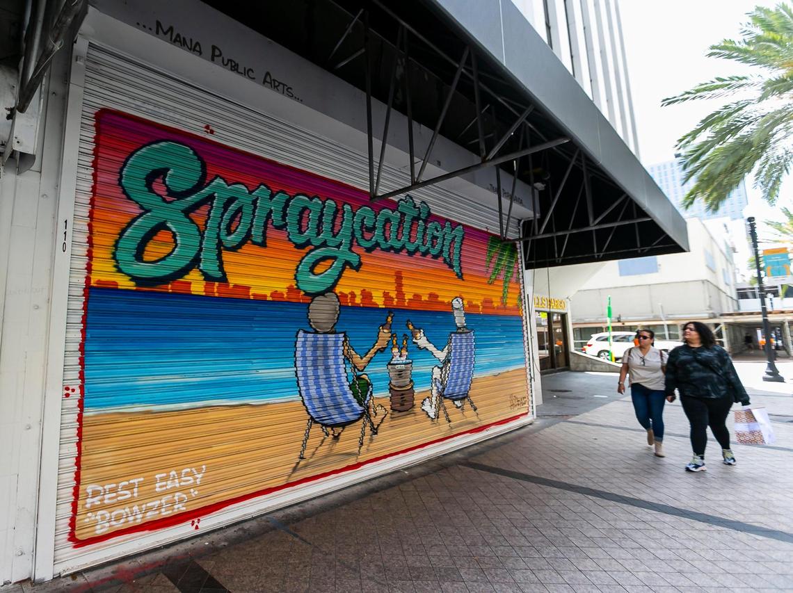 Entrepreneur Moishe Mana has commissioned street murals to decorate some of the shuttered storefronts he owns on East Flagler Street in downtown Miami.