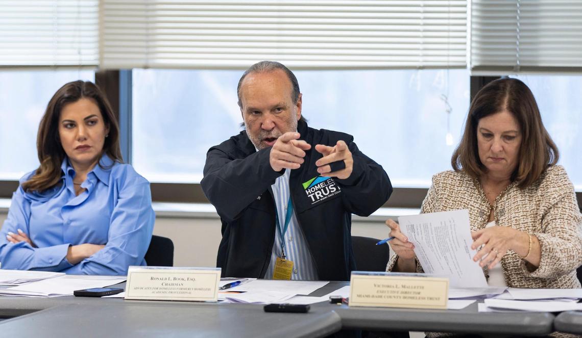 Ron Book, chairman of the Homeless Trust, reacts during a board meeting at the Stephen P. Clark Government Center on Friday, Dec. 20, 2024, in downtown Miami.