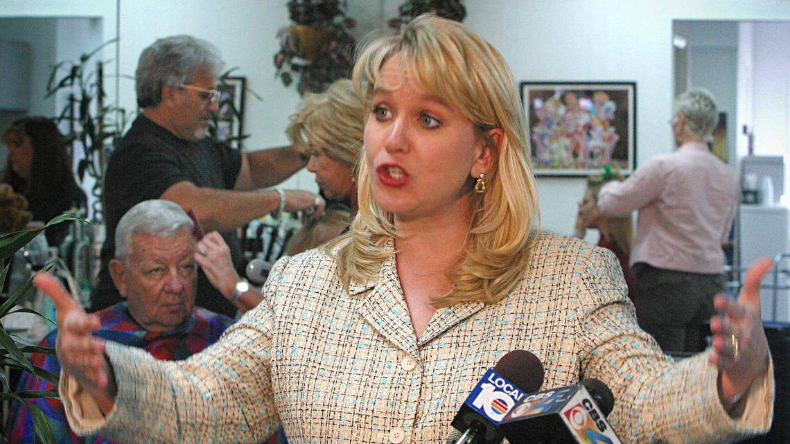 Tiffany Carr — shown during a 2004 visit to a Hollywood nail salon, where she spoke on domestic violence —  was the longtime CEO of the Florida Coalition Against Domestic Violence.