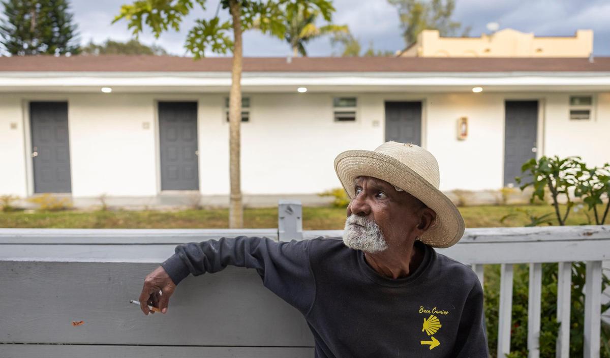 Orlando Palma, 73, a resident at Mia Casa, smokes a cigarette on Thursday, Jan. 16, 2025, in North Miami, Florida. Mia Casa, owned by Miami-Dade County’s Homeless Trust, supports 120 homeless seniors aged 65 and older with shelter and assistance transitioning to permanent housing.
