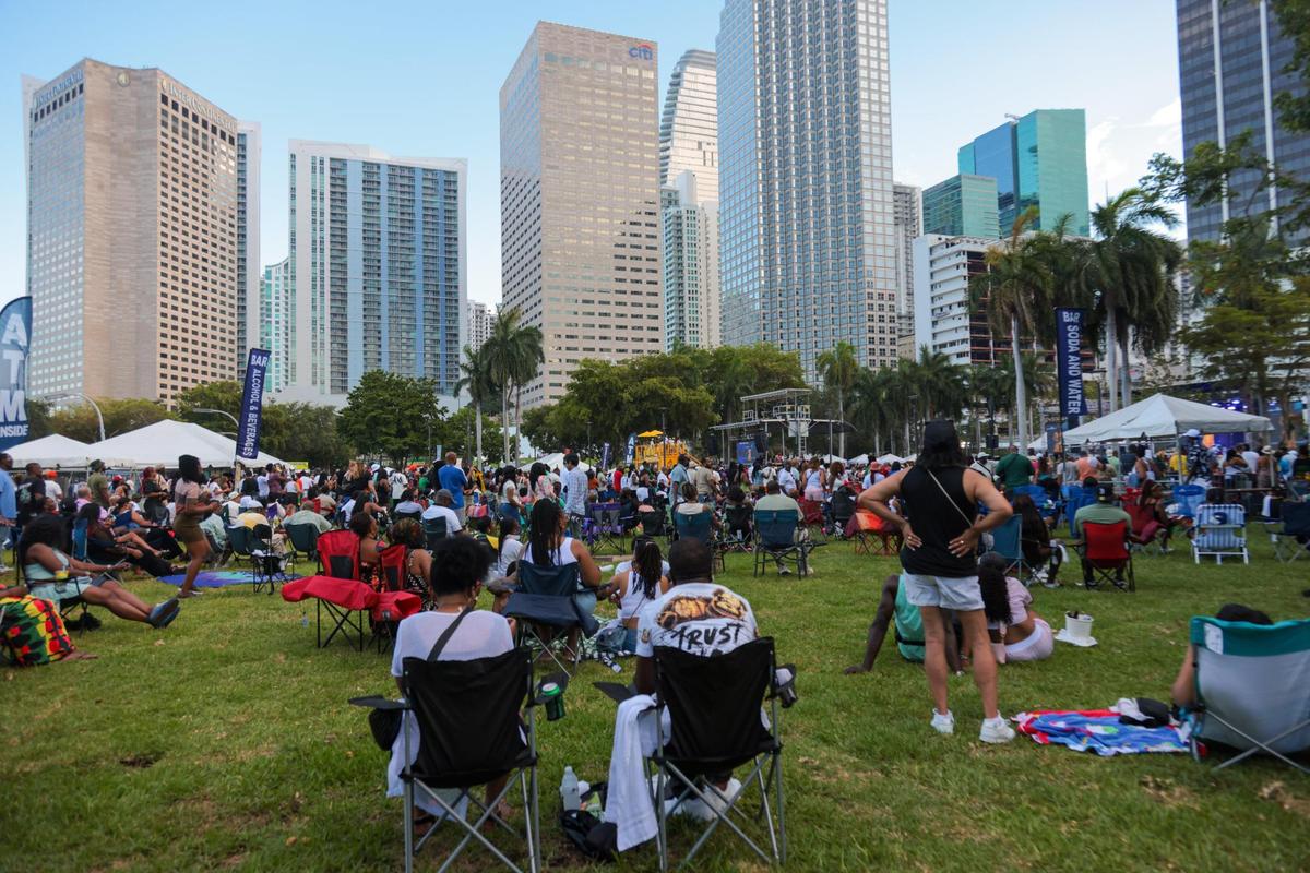 Concertgoers set up camping chairs on the lawn to enjoy a concert during the 19th annual Best of the Best International Music Festival at Bayfront Park in downtown Miami, Sunday, May 25, 2025. As the night went on there was hardly any place to walk.