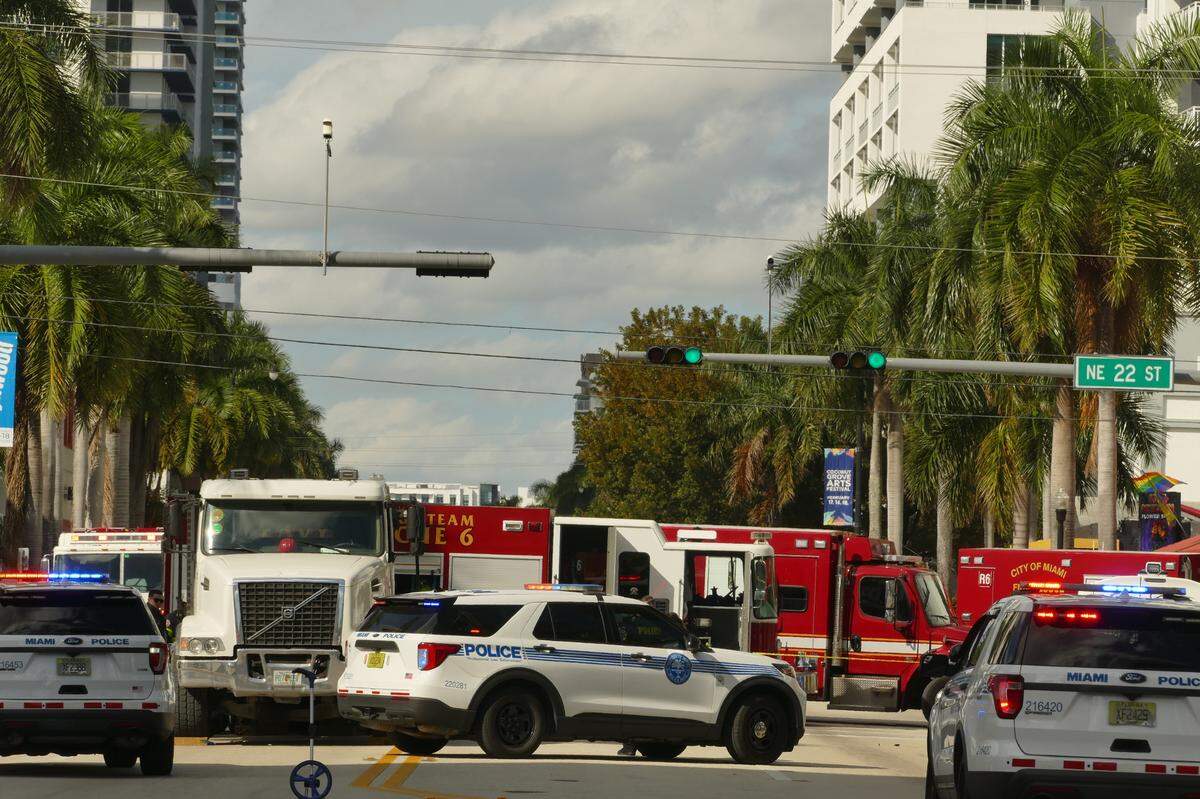 A woman pushing a baby in a stroller across Biscayne Boulevard was killed after being pinned under a dump truck on Wednesday, Feb. 14, 2024, Miami police said.