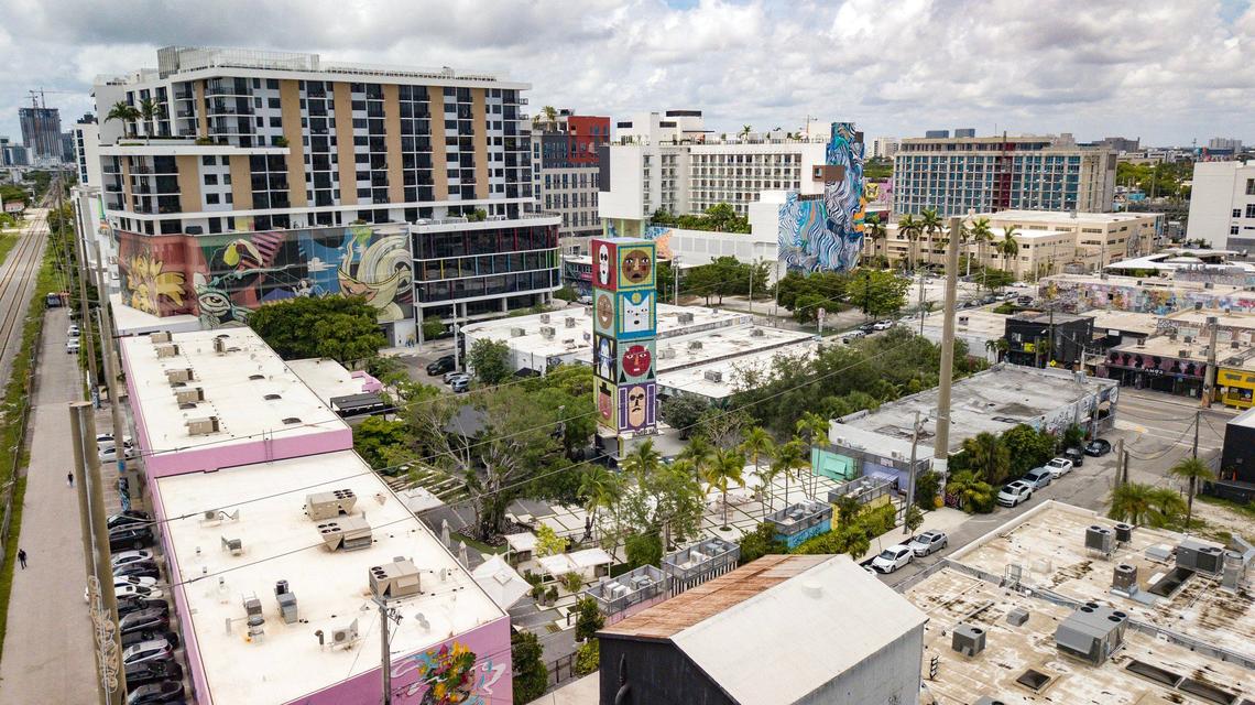 An aerial view of Miami’s Wynwood neighborhood, where old warehouses mix with new mid-rise buildings under a 10--year-old special zoning plan.