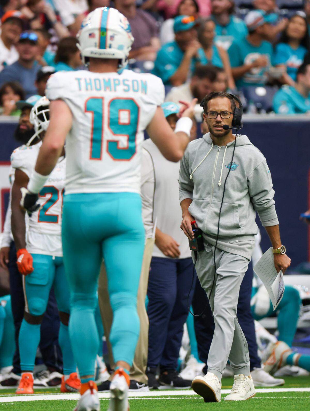 Aug 19, 2023; Houston, Texas, USA; Miami Dolphins quarterback Skylar Thompson (19) talks with head coach Mike McDaniels while playing against the Houston Texans in the third quarter at NRG Stadium. Mandatory Credit: Thomas Shea-USA TODAY Sports