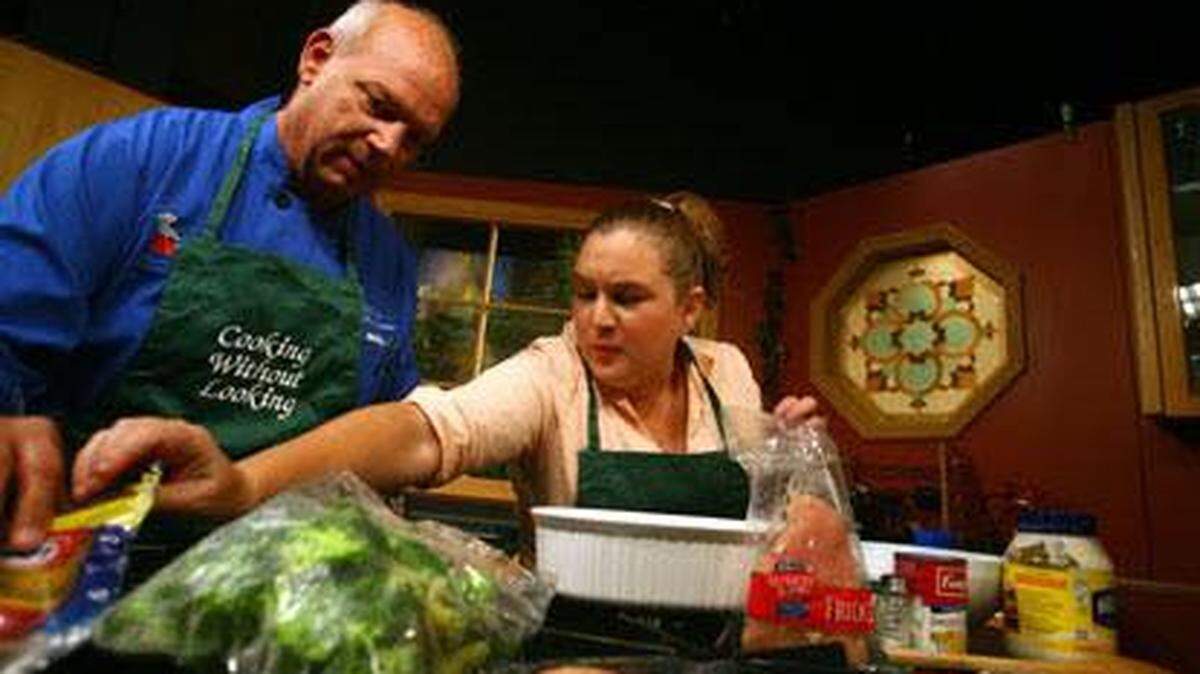 “Cooking Without Looking” Chef Tom Fox and Christina Panczak-Smith prepare a meal on the television show, which had aired on PBS.