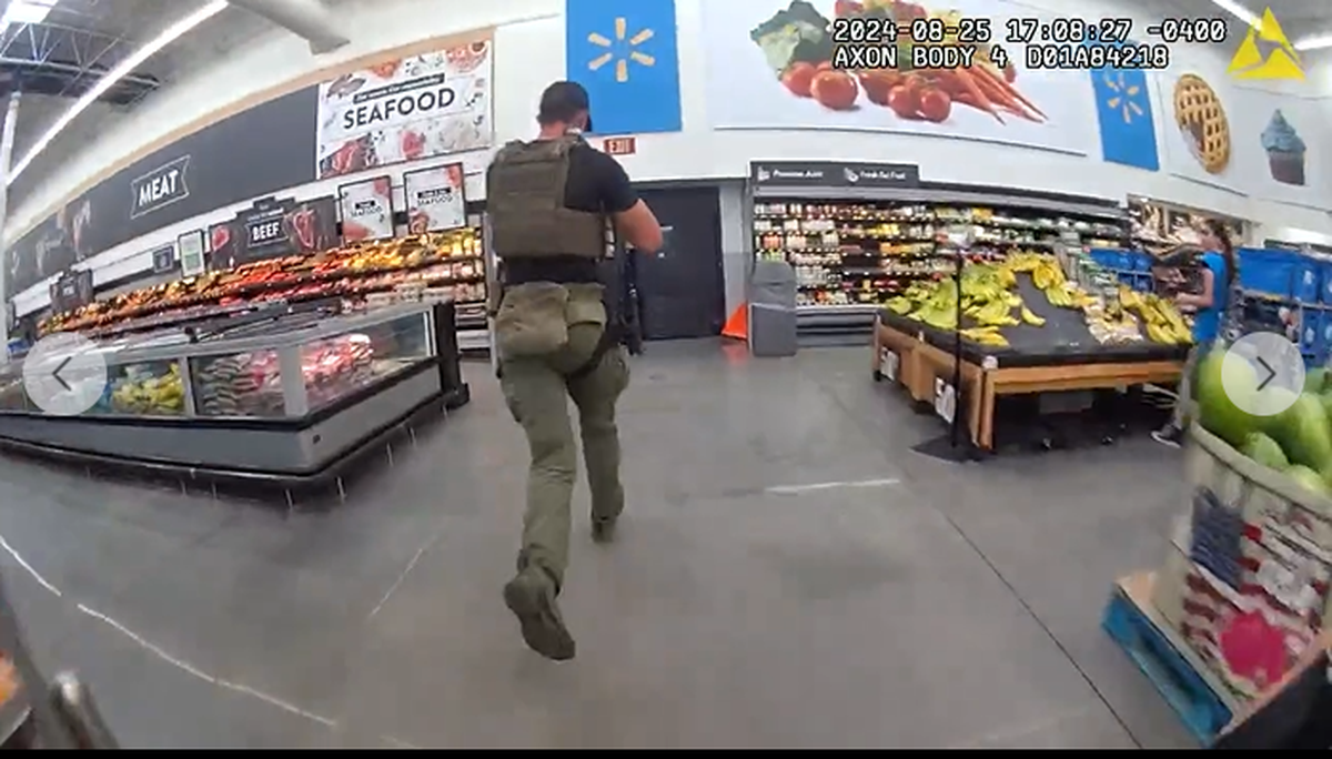 Shopping for vegetables got scary at a Florida Walmart, when deputies with guns pulled began tracking an extortion suspect through the produce section, body camera video shows.