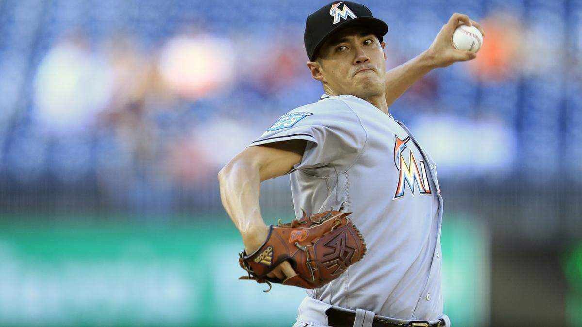 Miami Marlins starting pitcher Wei-Yin Chen (54) throws during the third inning of a baseball game against the Washington Nationals in Washington, Wednesday, Sept. 26, 2018. (AP Photo/Manuel Balce Ceneta)