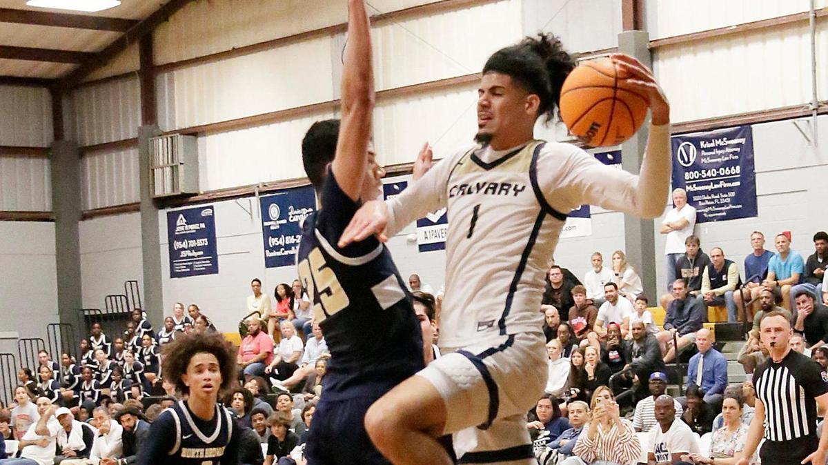 Calvary Christian Shon Abaev (1) goes for a shot against North Broward during regional basketball semifinal playoff game on Monday, February 17, 2025 at Calvary Christian School in Fort Lauderdake. Andrew Uloza / for Miami Herald