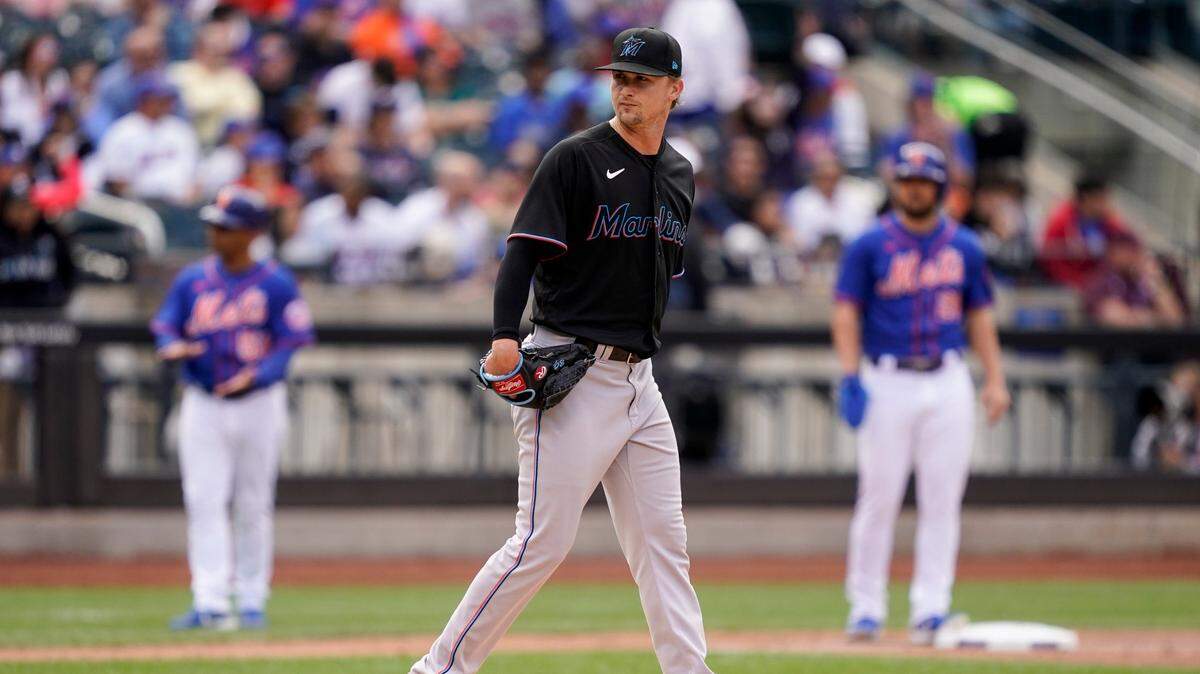 Miami Marlins starting pitcher Braxton Garrett (60) reacts after giving up an RBI single to New York Mets’ Jeff McNeil in the second inning of a baseball game, Saturday, June 18, 2022, in New York. (AP Photo/John Minchillo)