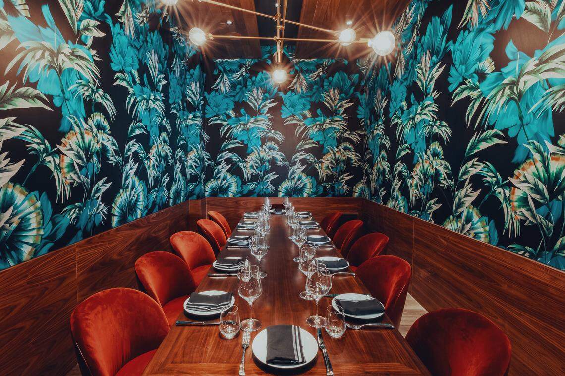The tropical glamour of Papi Steak’s interior design.