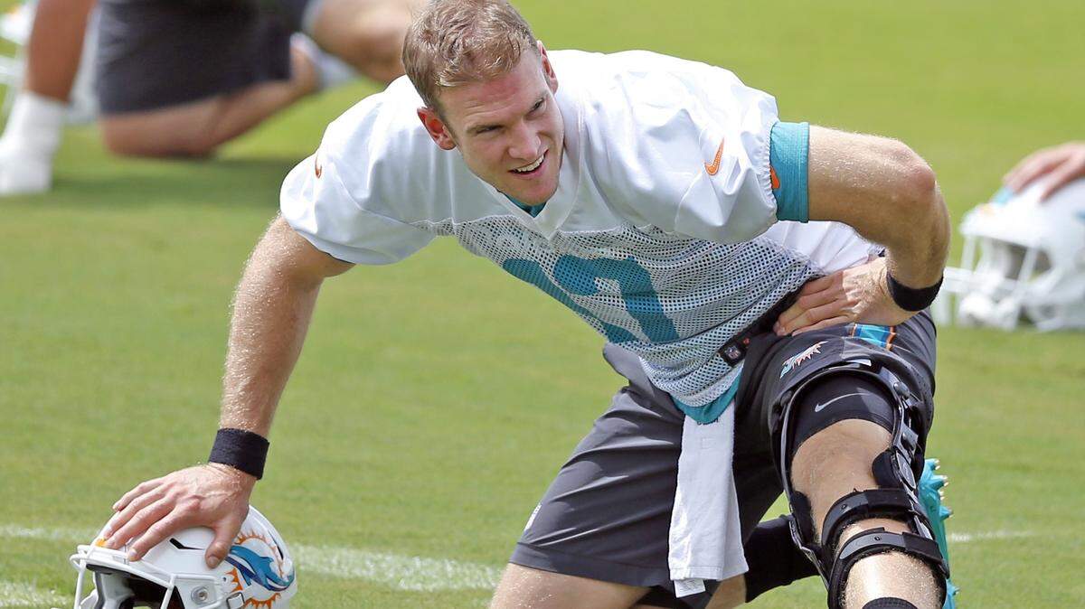During part of his tenure with the Miami Dolphins, Ryan Tannehill wore a large brace on his left knee. Knee braces can help protect and heal an injured knee.
