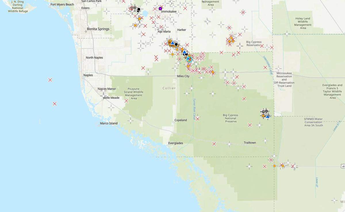 This map of oil and gas wells in Florida shows the cluster of exploratory wells, active wells and abandoned or sealed wells within Big Cypress National Preserve. The primary oil drilling locations are Raccoon Point to the east and Bear Island to the north.