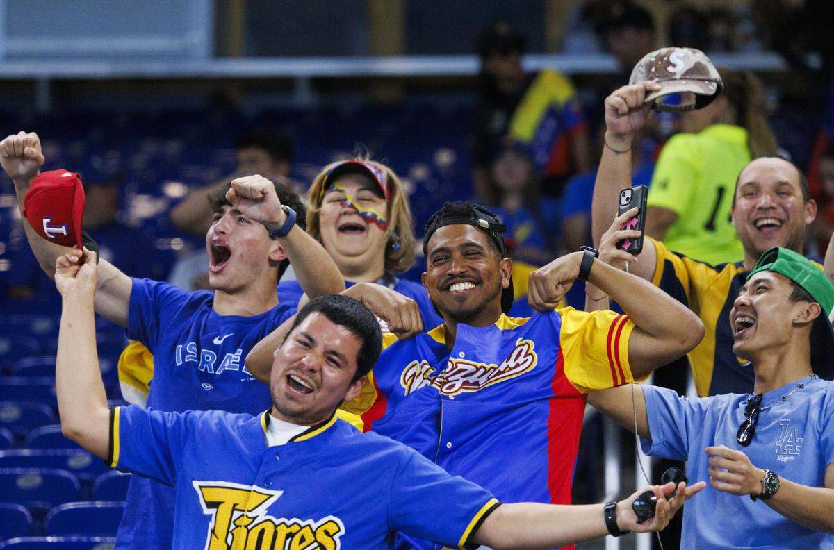 Venezuela fans cheer before the first inning of a World Baseball Classic game against the Nicaragua on Monday, March 9, 2026, at loanDepot Park in Miami, Fla. 