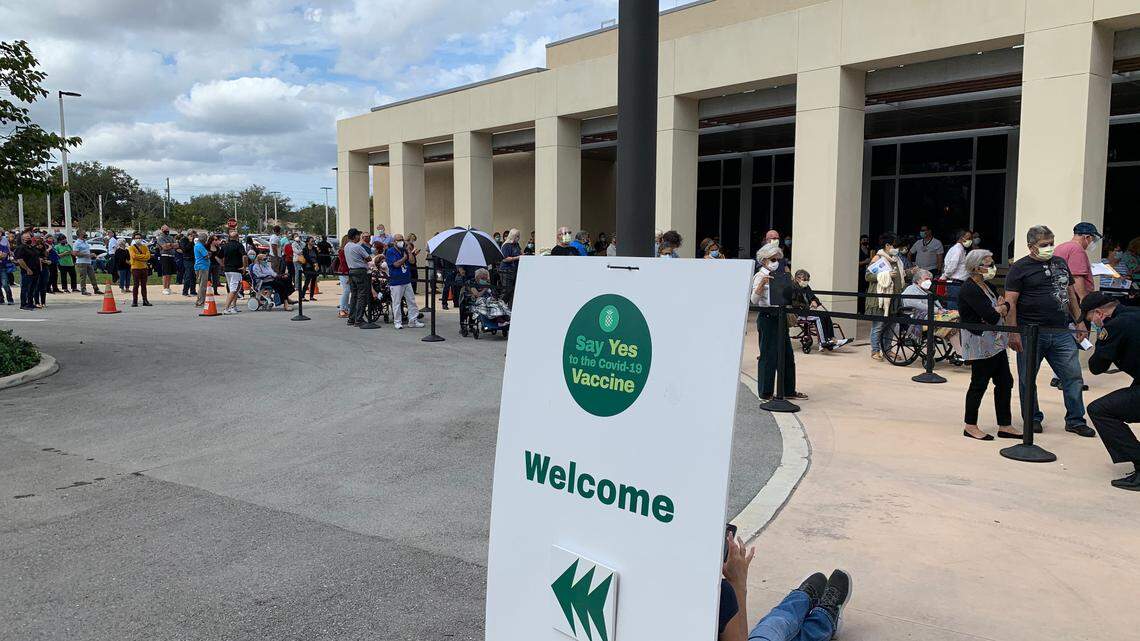 On the first day Baptist Health began administering the COVID-19 vaccination, lines formed at the site on the Hilton grounds on the hospital’s Kendall campus on Jan. 11, 2021.