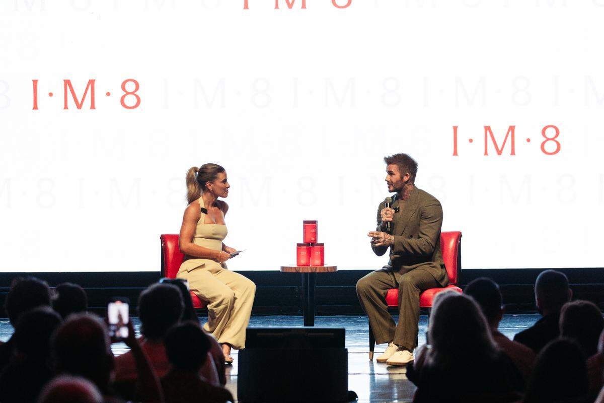 (Left to right) Mental health advocate and former Peloton instructor Kendall Toole speaks with retired soccer star David Beckham on why he started IM8 and how he uses the supplement in his life.
