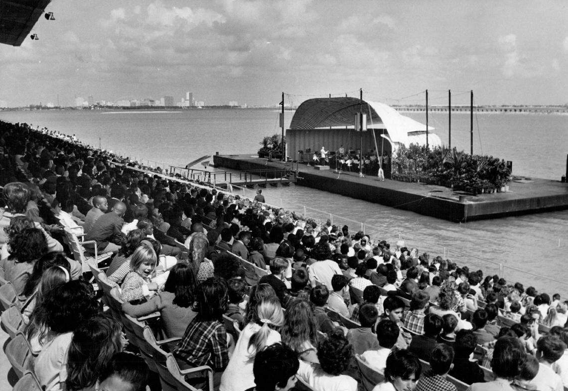 About 6,500 schoolchildren attended a Young People’s Concert of the Greater Miami Philharmonic at Marine Stadium in 1966 at Miami Marine Stadium. Composer Leroy Anderson conducted the orchestra on the floating stage in front of the outdoor arena on Biscayne Bay.