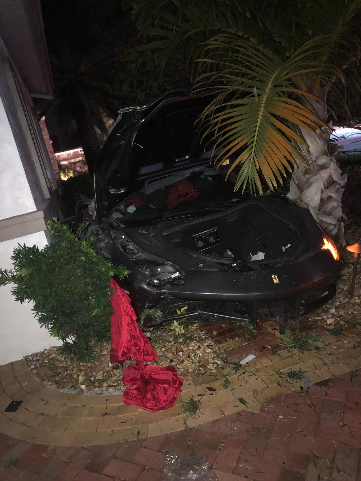 A picture of what a witness says is the crashed 2018 Ferrari 488 Spider. The photographer, who wishes to remain anonymous, said the sports car was crashed into a house about 200 yards from Patsy Truglia’s Parkland home.