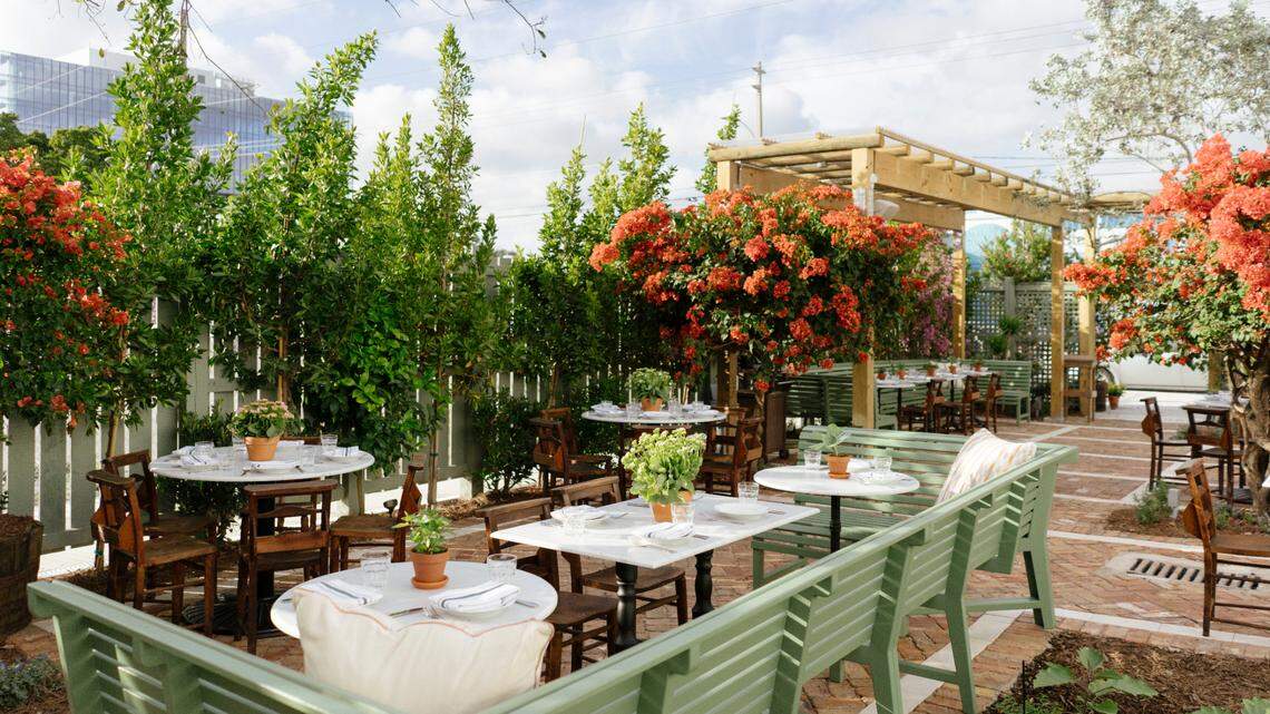 The outdoor garden and dining area at the new Rosemary’s Italian restaurant in Wynwood.