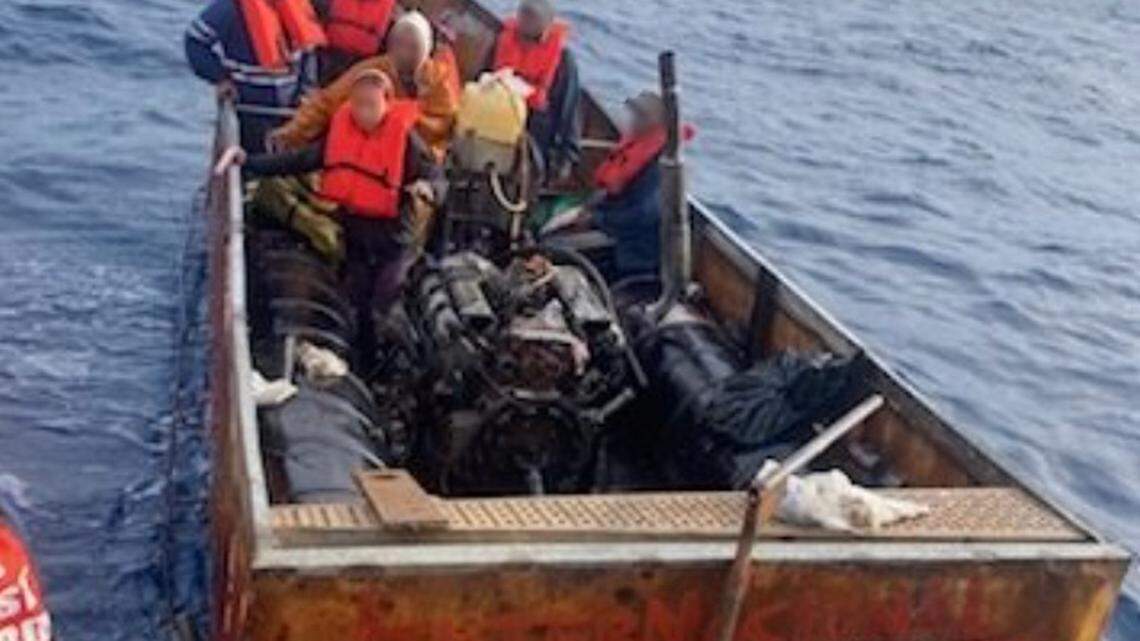 A group of people are underway in a Cuban migrant boat the U.S. Coast Guard stopped in December 2023 before it reached the Florida Keys.