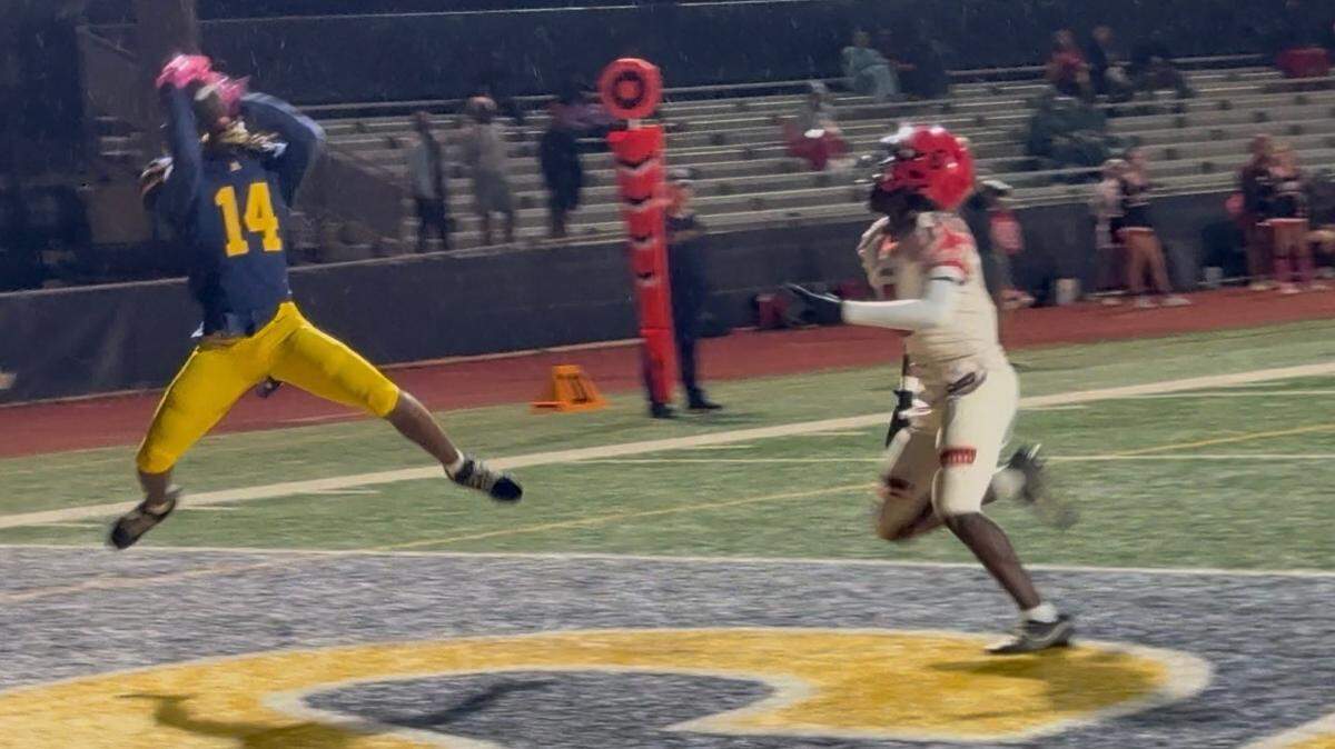 St. Thomas Aquinas receiver Ah’mari Stevens hauls in a 19-yard touchdown pass from Andrew Indorf during a win over Monarch.