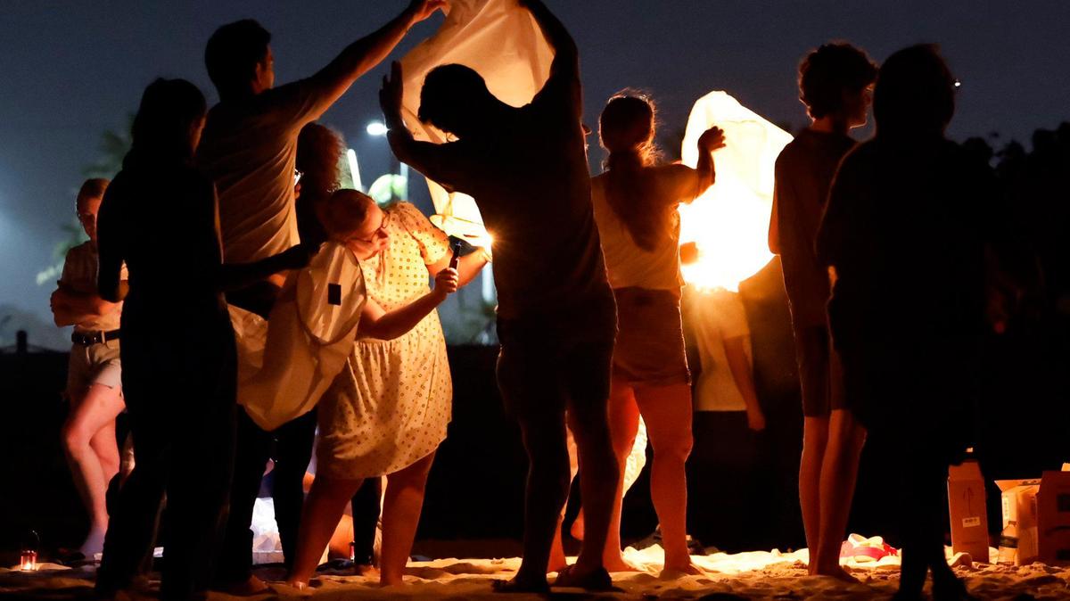 Loved ones honored the lives lost in Surfside. See photos of the touching ceremonies