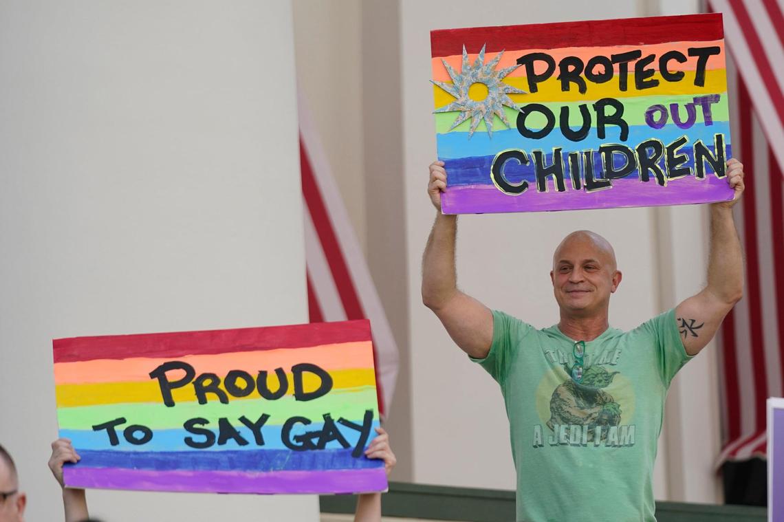 Demonstrators gather on the steps of the Florida Historic Capitol Museum in front of the Florida State Capitol, Monday, March 7, 2022, in Tallahassee, Fla. Florida House Republicans advanced a bill, dubbed by opponents as the “Don’t Say Gay” bill, to forbid discussions of sexual orientation and gender identity in schools, rejecting criticism from Democrats who said the proposal demonizes LGBTQ people.